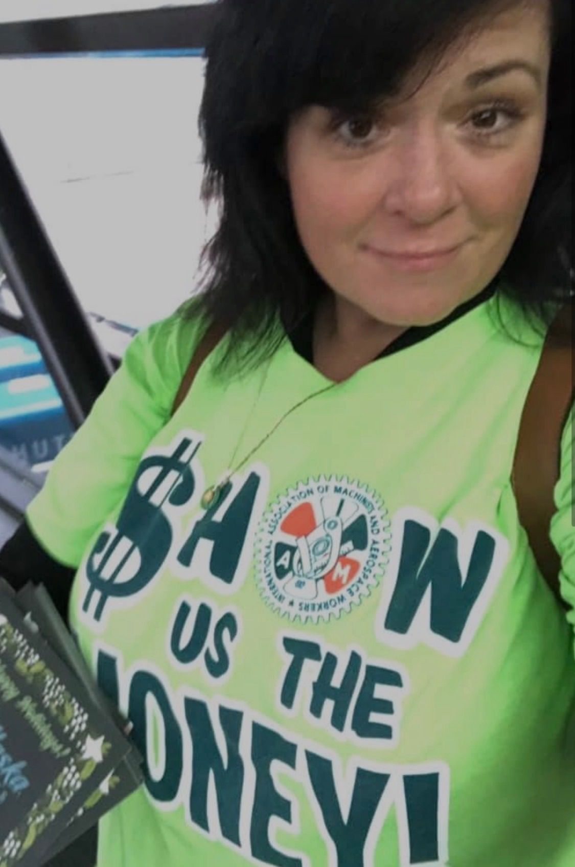 VICE PRESIDENT candidate Annette Smith wearing a lime-green IAM union shirt