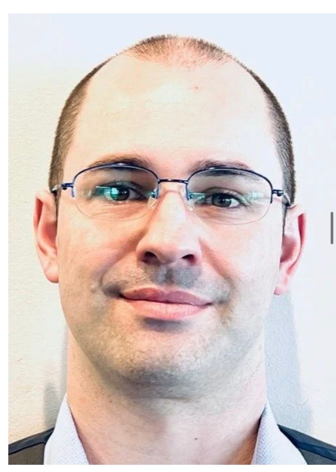Craig Magone, Trustee candidate, wearing glasses